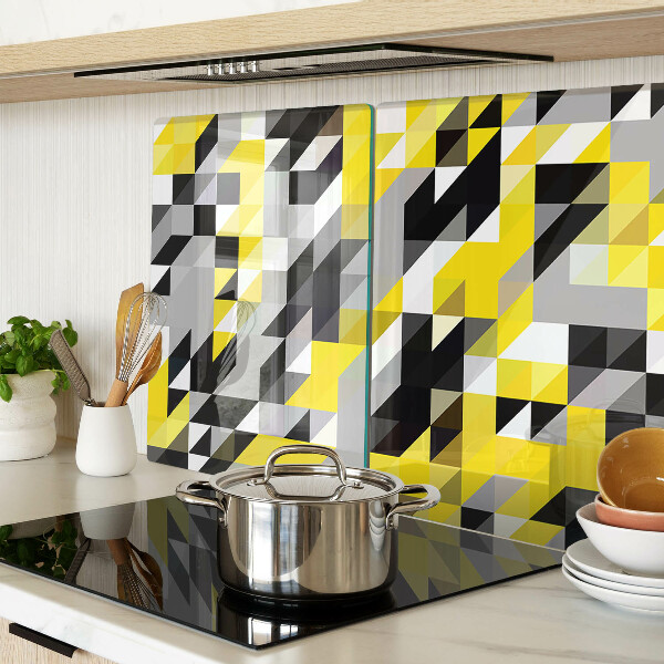 Snijplanken van glas Geometrische vormen in geel en zwart.