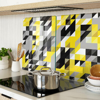 Snijplanken van glas Geometrische vormen in geel en zwart.