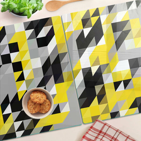 Snijplanken van glas Geometrische vormen in geel en zwart.
