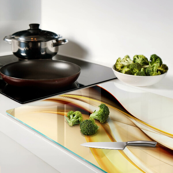 Deska kuchenna szklana Abstrakcyjne fale w odcieniach złota