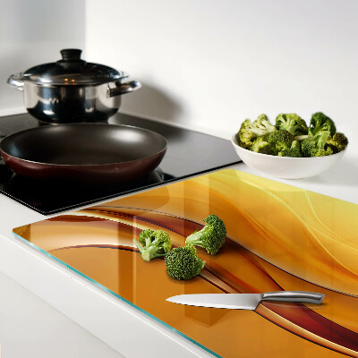 Snijplanken van glas Golven in goudtinten