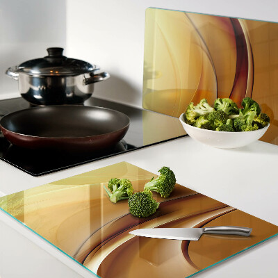 Snijplanken van glas Golven in goudtinten