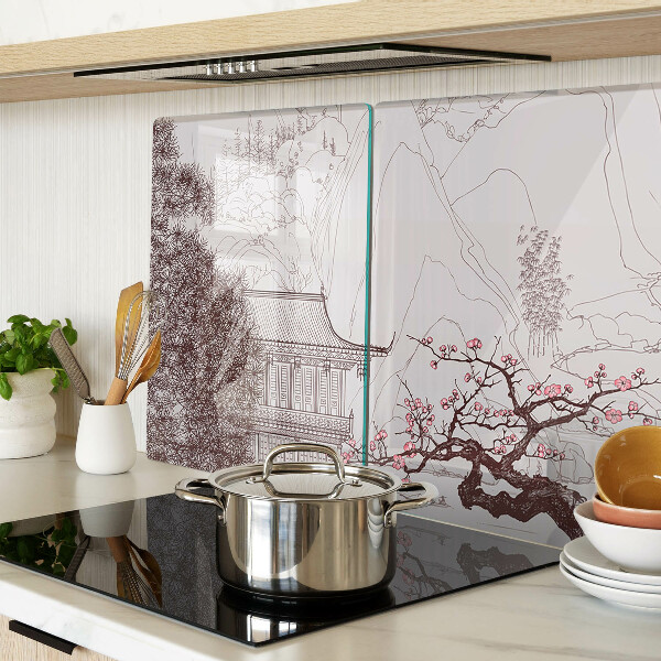 Szklana deska kuchenna Krajobraz górski z kwitnącymi drzewami