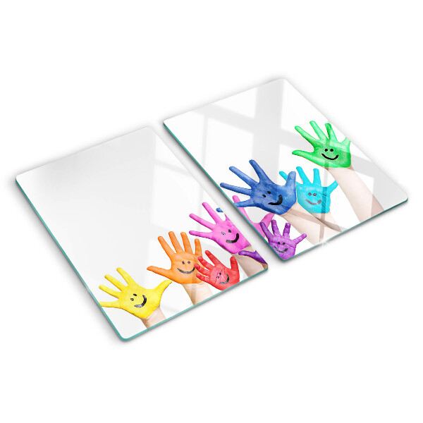Snijplanken van glas Kleurrijke lachende handen