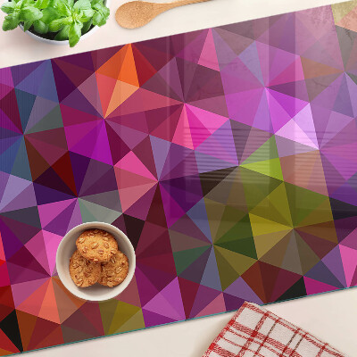 Glazen snijplanken Geometrische vormen in roze en paarse tinten.