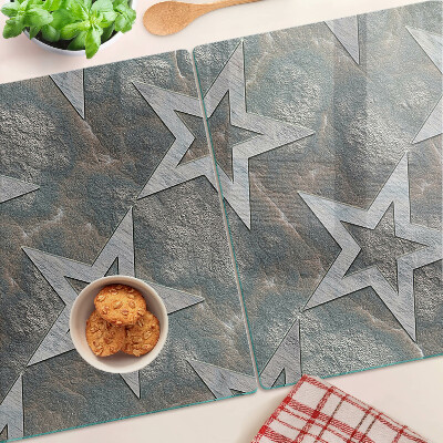 Snijplanken van glas Sterren op een textuurachtergrond