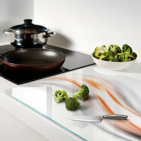 Snijplanken glas Golven in tinten oranje en grijs.