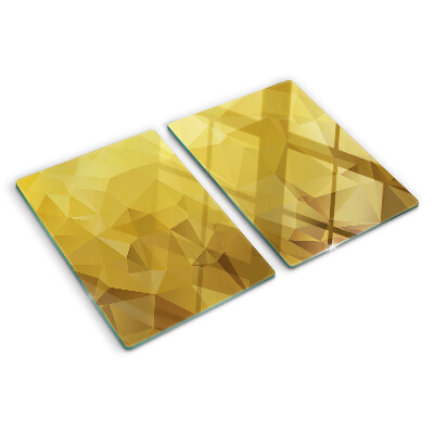 Snijplanken van glas Geometrische vormen in goudtinten