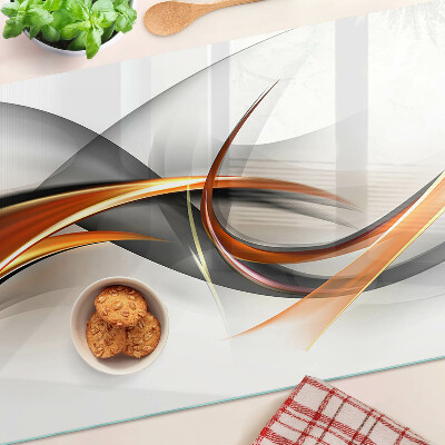 Szklana deska kuchenna Abstrakcyjne fale w odcieniach złota