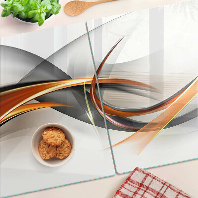 Szklana deska kuchenna Abstrakcyjne fale w odcieniach złota