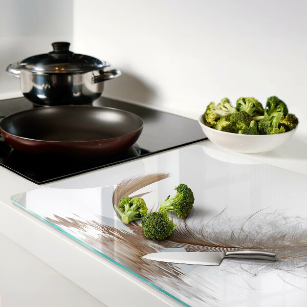 Deska kuchenna szklana Pióro na tle wody