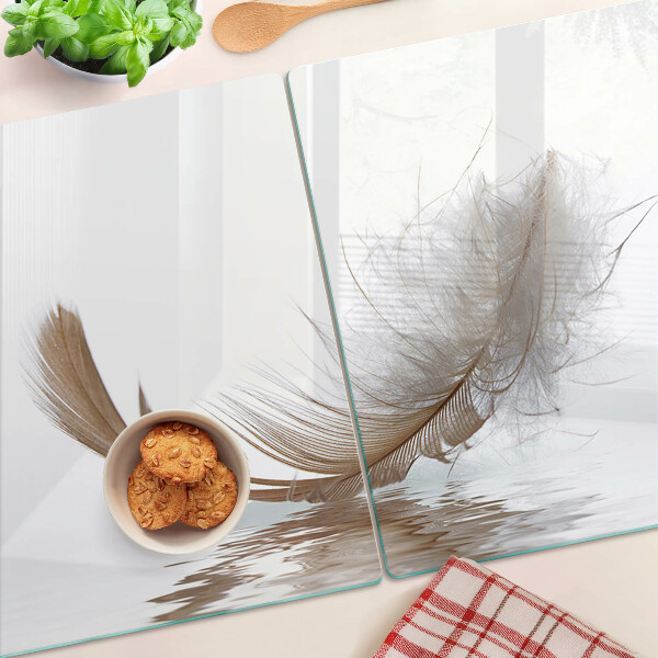 Glazen snijplanken Een veer tegen het water