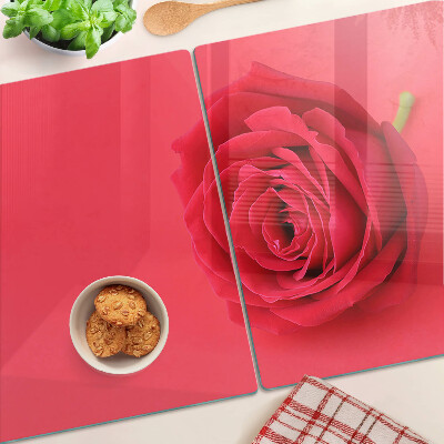 Snijplanken glas Rode roos op de achtergrond