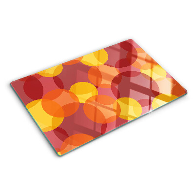 Glazen snijplanken Kleurrijke cirkels in warme tinten.