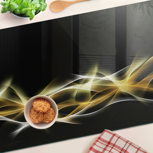 Snijplanken van glas Een golf van licht in gouden tinten