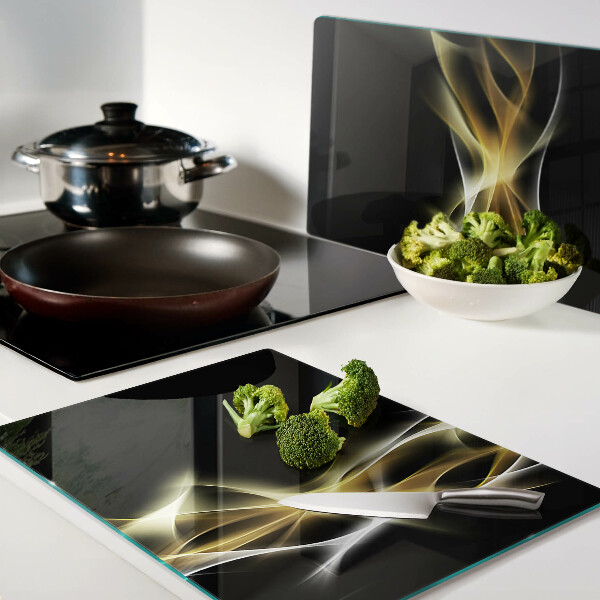 Snijplanken van glas Een golf van licht in gouden tinten