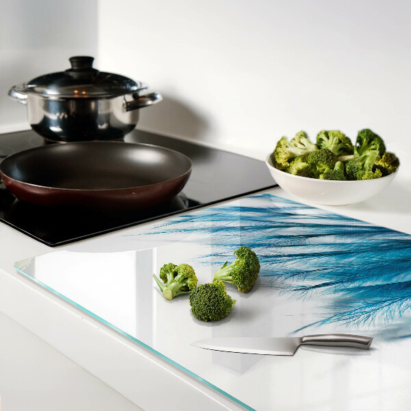 Deska kuchenna szklana Niebieskie pióra na białym tle