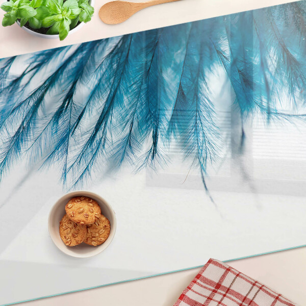 Deska kuchenna szklana Niebieskie pióra na białym tle
