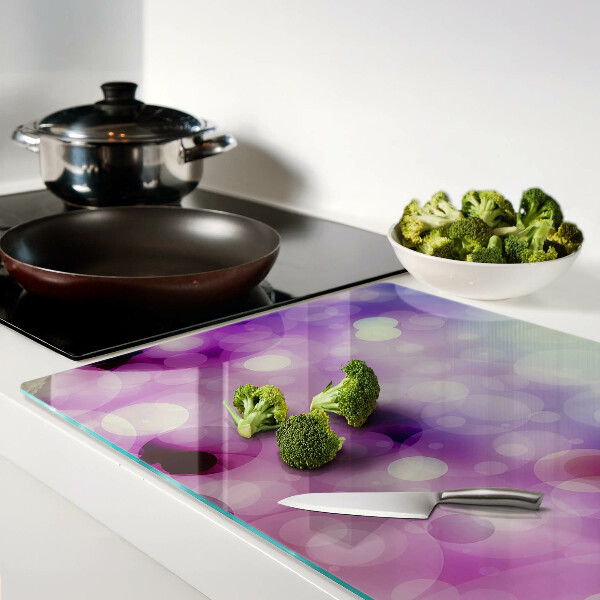 Snijplanken van glas Bokeh in paarse en roze tinten.