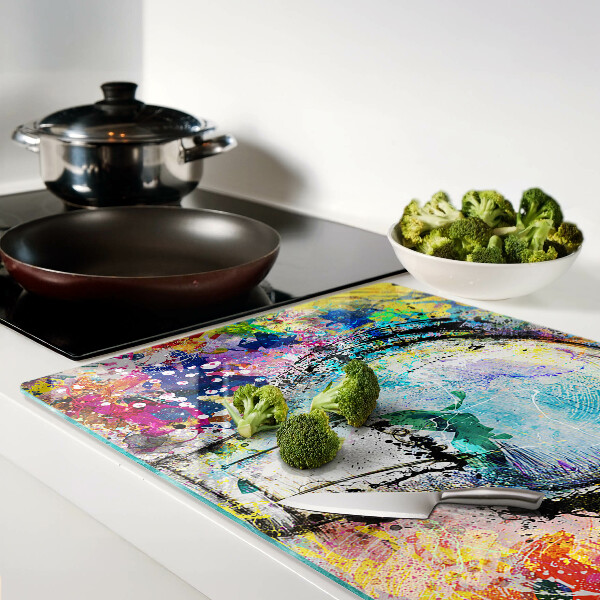 Snijplanken glas Gloeilamp op een gekleurde achtergrond