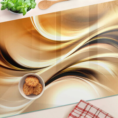 Szklana deska kuchenna Abstrakcyjne fale w odcieniach złota