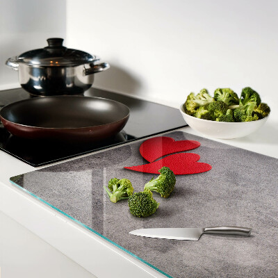 Snijplanken glas Een hart tegen de achtergrond van een raam.