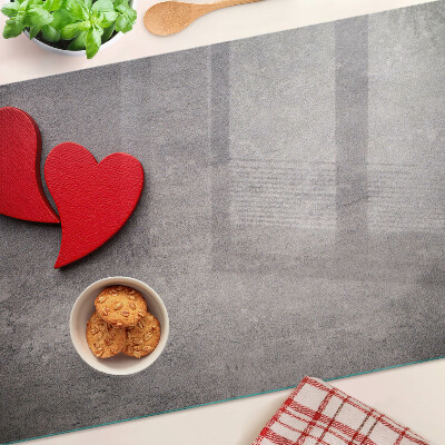 Snijplanken glas Een hart tegen de achtergrond van een raam.