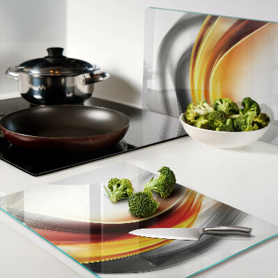 Szklana deska do krojenia Fale w kolorach pomarańczowym i czarnym