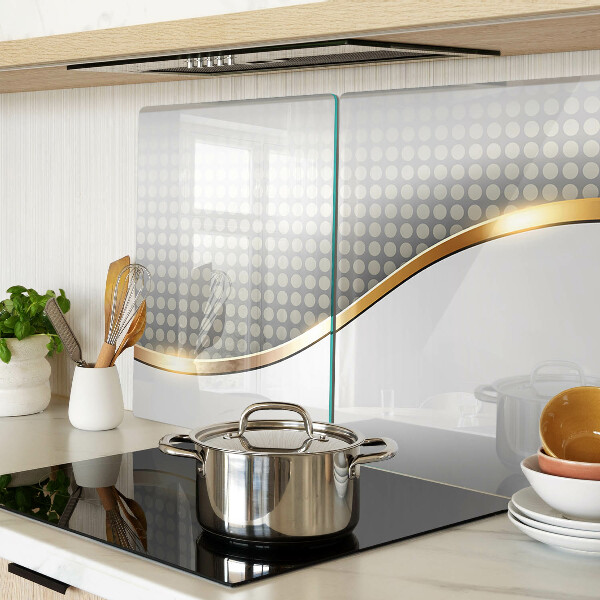 Szklana deska kuchenna Złota fala na tle kropek