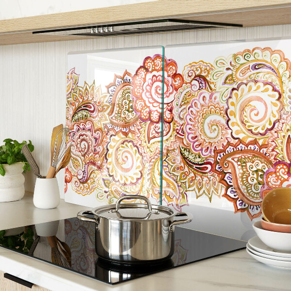 Snijplanken van glas Paisley-motief in tinten rood en goud.