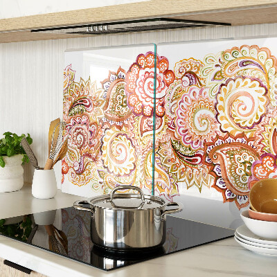 Snijplanken van glas Paisley-motief in tinten rood en goud.