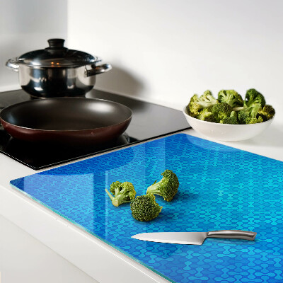 Snijplanken van glas Een golvend patroon in verschillende blauwtinten.