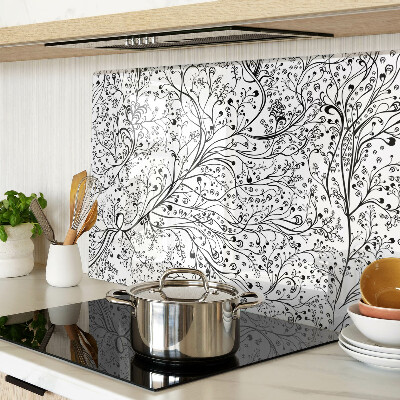 Snijplanken van glas Een plantenpatroon met delicate takken.