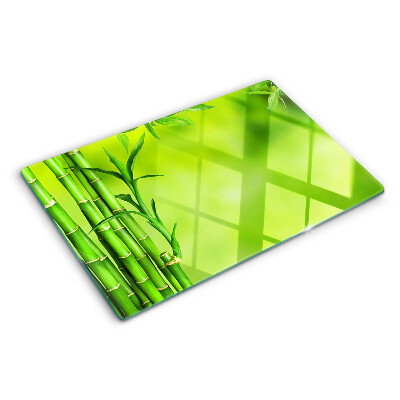 Szklana deska do krojenia Bamboo on a green background