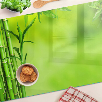Glazen snijplanken Bamboe op een groene achtergrond