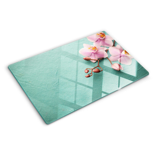 Szklana deska kuchenna Orchidee na tle niebieskim