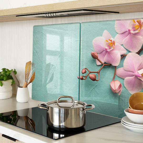 Szklana deska kuchenna Orchidee na tle niebieskim