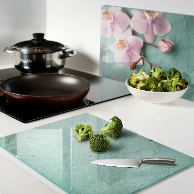 Szklana deska kuchenna Orchidee na tle niebieskim