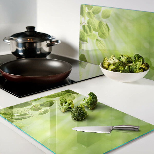 Szklana deska do krojenia Zielone liście na tle światła