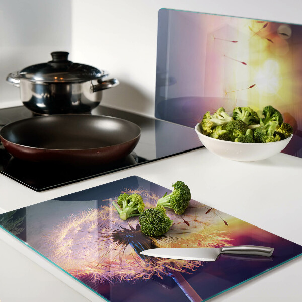 Szklana deska do krojenia Dmuchawce na tle zachodu słońca