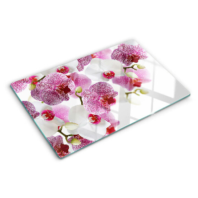 Szklana deska do krojenia Orchidee na tle okna