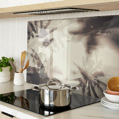 Szklana deska kuchenna Palmy na tle monochromatycznym