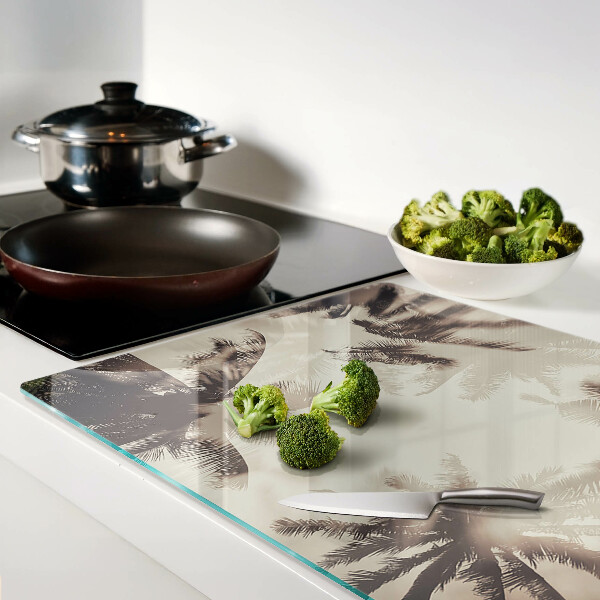 Szklana deska kuchenna Palmy na tle monochromatycznym