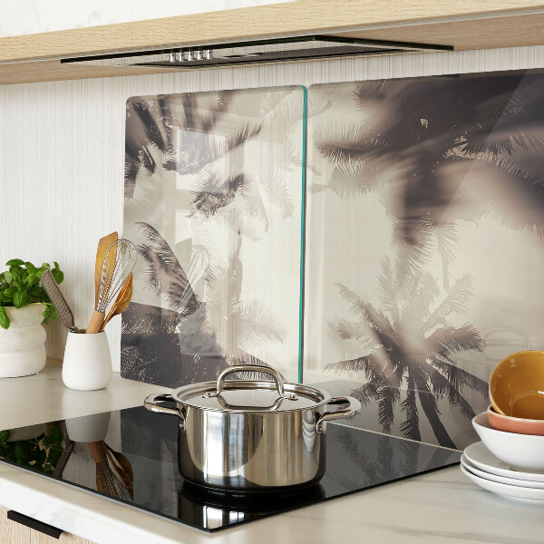 Szklana deska kuchenna Palmy na tle monochromatycznym