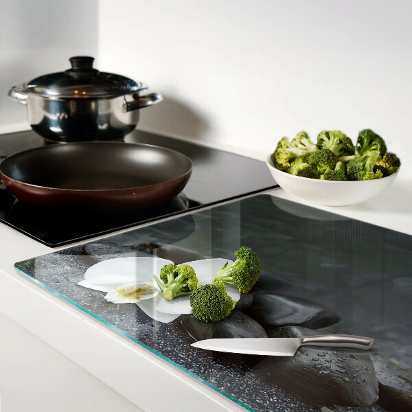 Szklana deska do krojenia Kwiat orchidei na kamieniach