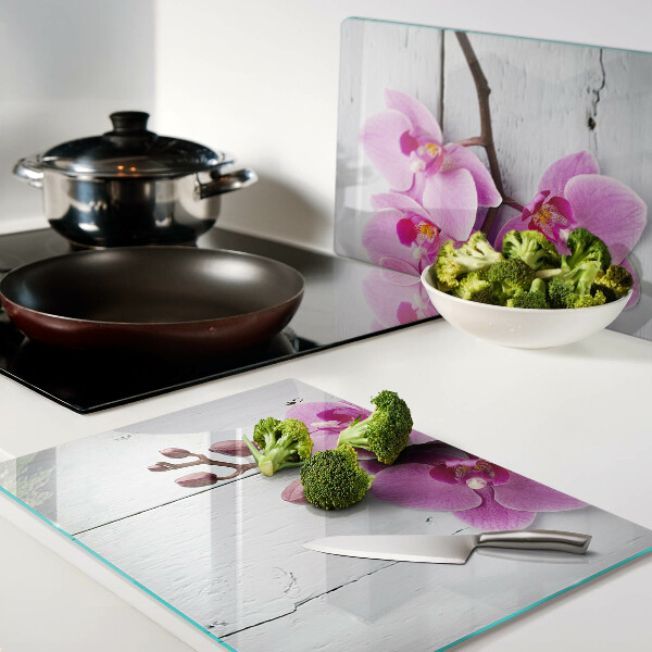 Szklana deska do krojenia Orchidee na białym tle
