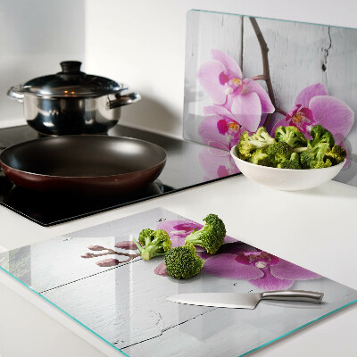 Glazen snijplanken Orchideeën op een witte achtergrond