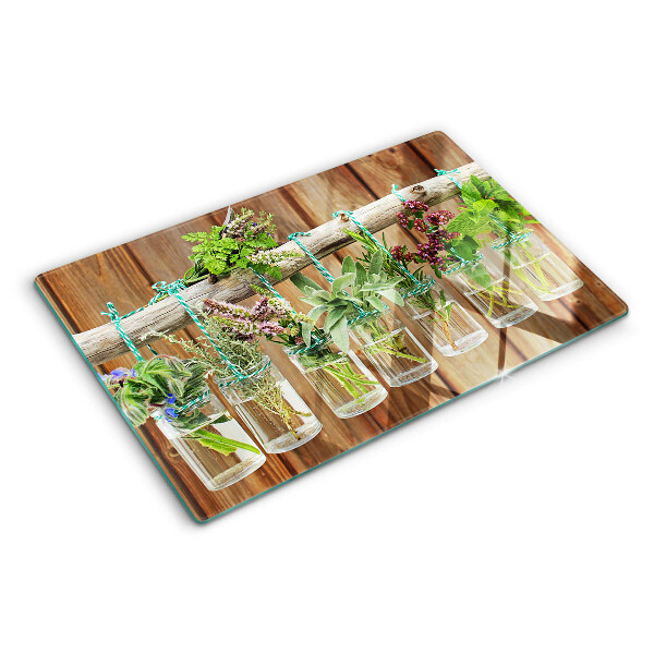 Szklana deska kuchenna Zioła w słoikach na tle drewna
