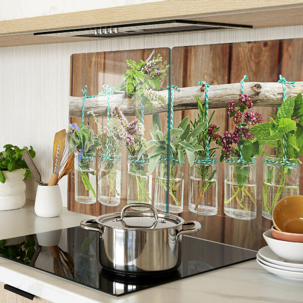 Szklana deska kuchenna Zioła w słoikach na tle drewna