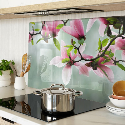 Szklana deska do krojenia Kwiaty magnolii na tle zieleni